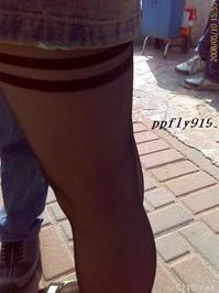 美腿走光 - 偷拍超短牛仔裙少妇 - 16.jpg